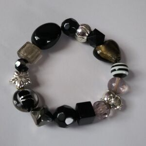 Black Beaded heart,owl,star, flower stretchy bracelet.